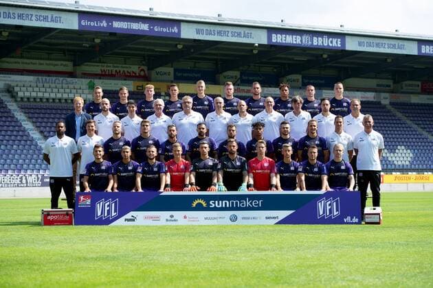 VfL Osnabrück 2 BL, portrait date 2019 2020, team photo, 4 row v left Sven Köhler, Moritz Heyer, Simon Haubrock, Thomas Konrad, Lukas Gugganig, Kevin Friesenbichler, Marc Heider, Etienne Amenyido, Adam Susac, Niklas Schmidt 3 row v left Benjamin Schmedes Sports Director , Julius Ohnesorge Team Manager , Rafael Ramos Gameiro Video Analyst , Manfred Glüsenkamp Sports Psychologist , Dr Thomas Herzig Team Doctor , Dr Clemens Kruse Team Doctor , Patrick Jochmann Athletics Trainer , Björn Ernst Osteopath , Günter Schröder Physiotherapist , Lennart Bartling Physiotherapist , Mario Richter Zeugwart 2 row v left Daniel Thioune Head Coach , Merlin Polzin Co Trainer , Alexander Riemann, Benjamin Girth, Manuel Farrona Pulido, Marcos Alvarez, Kevin Wolze, Felix Agu, Konstantin Engel, Ulrich Taffertshofer, Tim Danneberg Co Trainer , Rolf Meyer Goalkeeping trainer 1 row from left Bashkim Ajdini, Anas Ouahim, David Blacha, Laurenz Beckemeyer, Nils Körber, Philipp Kühn, David Buchholz, Sebastian Klaas, Nico Granatowski, Bryan Henning Maurice Trapp Osnabrück Lower Saxony Germany Stadium at the Bremer Brücke is missing