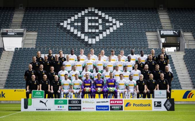 Mönchengladbach, 01 08 2019 L R, first row transition trainer Eugen Polanski, athletic trainer Alexander Mouhcine, athletic trainer Patrick Eibenberger, Denis Zakaria, Andreas Poulsen, Christoph Kramer, Michael Lang, Tobias Strobl, Louis Beyer, Marcus Thuram, Breel Embolo, athletic trainer Quirin Löppert, athletic trainer Markus Müller, L R, second row goalkeeper coach Uwe Kamps, goalkeeper coach Steffen Krebs, co coach Alexander Zickler, Oscar Wendt, Alassane Plea, Matthias Ginter, Nico Elvedi, Laszlo Benes, Torben Müsel, Mamadou Doucoure, co coach Frank Geideck, co coach Rene Maric, head coach Marco Rose, L R, third row physiotherapist Dirk Müller, physiotherapist Benedikt Bohnen, Masseur Adam Szordykowski, Lars Stindl, Fabian Johnson, Patrick Herrmann, Ibrahima Traore, Tony Jantschke, Michael Cuisance, Keanan Bennetts, Florian Neuhaus, Physiotherapist Holger Wagner, Physiotherapist Hendrik Schreiber, Head of Medicine and Prevention Dr Andreas Schlumberger, L R, back row bus driver and Zeugwart Marcus Breuer, Supervisor Christian Rieger, Supervisor Rolf Hülswitt, Julio Villalba, Stefan Lainer, Goalkeeper Tobias Sippel, Goalkeeper Yann Sommer, Goalkeeper Max Grün, Jonas Hofmann, Raffael, Team Doctor Dr Heribert Ditzel, Team Doctor Dr Ralf Doyscher, Team Doctor Dr Stefan Hertl Portrait Date 2019 2020 Team Photo Borussia Mönchengladbach