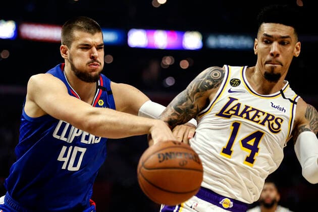 March 8, 2020, Los Angeles, California, U.S: Los Angeles Lakersâ€⠢ Danny Green (14) and Los Angeles Clippersâ€⠢ Ivica Zubac (40) fight for the ball during an NBA, Basketball Herren, USA basketball game between the Los Angeles Clippers and Los Angeles Lakers, Sunday, March 8, 2020, in Los Angeles. Los Angeles U.S. - ZUMAc68_ 20200308_zaf_c68_064 Copyright: xRingoxChiux