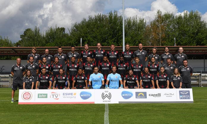 19 08 2020, xjhx, Soccer 3 Liga, SV Wehen Wiesbaden photo session season 2020 21 emspor, team photo Porträttermin 2020 2021, 3 rows from left Daniel Ebbert Head of Scouting Analysis , Dr Achim Bitschnau Team doctor , Dr Michael Hoestermann team doctor, Marjan Petkovic goalkeeper coach, Florian Carstens, Benedikt Röcker, Jakov Medic, Phillip Tietz, Sebastian Wagener athletics coach, Dr Tammo Quitzau team doctor hygiene officer, Jürgen core physiotherapist , Philipp Gründler Senior Scout Analyst 2 row from left Mike Krannich Co-Trainer , Rüdiger Rehm Head Coach , Johannes Wurtz, Stefan Aigner, Maurice Malone, Sascha Mockenhaupt, Marvin Ajani, Paterson Chato, Marc Lais, Tobias Schwede, Gerhard Eckel Supervisor , Torsten Conradi Supervisor 1 row from left Julia Wallraff Assistant to the Sports Director, Sebastian Mrowca, Moritz Kuhn, Michael Guthörl, Arthur Lyska, Tim Boss, Ben Bischof, Michel Niemeyer, Gianluca Korte, Shaline Deuchert Physiotherapist Wiesbaden