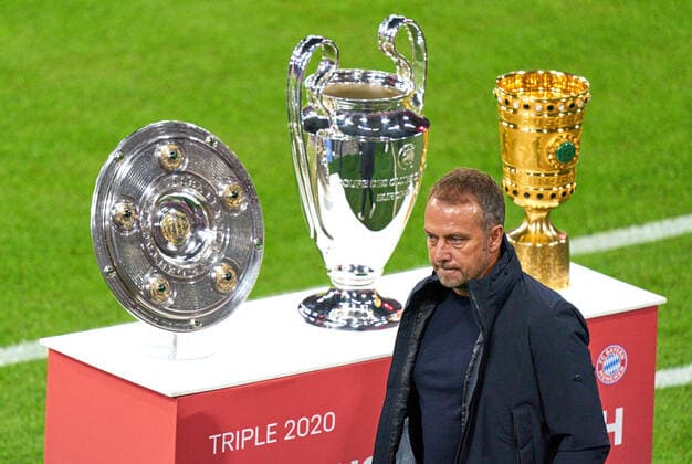 Football Munich - Schalke, Munich Sept 18, 2020. Trainer Hansi FLICK (FCB), team manager, headcoach, coach, passes trophy german championship, Meisterschale, Schale, Teller, Trophaee, Deutsche Meisterschaft, Meister-schale, Champions League Pokal, Pott, ceremony, DFB-Pokal, Pokal, FC BAYERN MUENCHEN - FC SCHALKE 04 8-0 - DFL REGULATIONS PROHIBIT ANY USE OF PHOTOGRAPHS as IMAGE SEQUENCES and or QUASI-VIDEO - 1.German Soccer League , Munich, September 18, 2020. Season 2020 2021, match day 01, FCB, München, Munich
