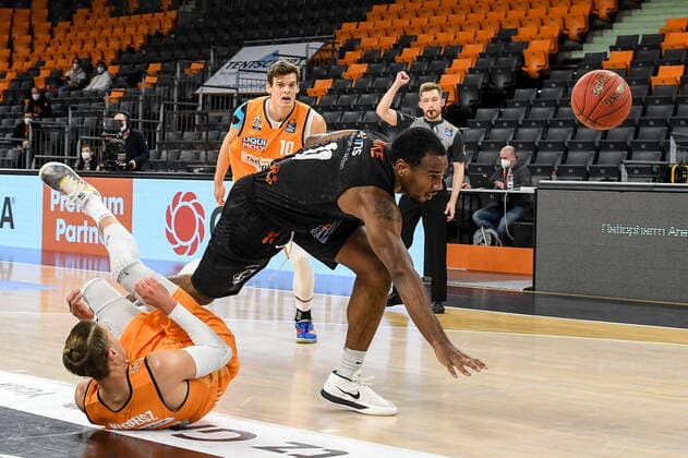 GER, BBL, ratiopharm ulm vs NINERS Chemnitz 24 01 2021, ratiopharm arena, Neu Ulm, GER, BBL, ratiopharm ulm vs NINERS Chemnitz, in picture Thomas Klepeisz Ulm, 22 goes down after fighting for the ball, Mike Isiaha Chemnitz, 11 cant control the ball anymore and stumbles nordphoto.GmbHx xHafner nph00200