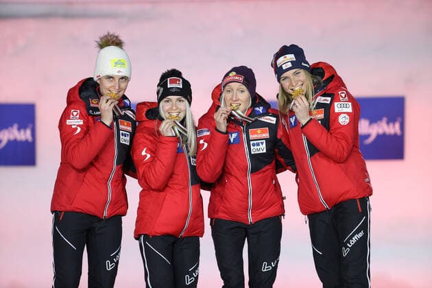 NORDIC SKIING - FIS Nordic World Ski Championships Oberstdorf 2021 OBERSTDORF,GERMANY,27.FEB.21 - NORDIC SKIING, Ski jumping, Skispringen, Ski, nordisch - FIS Nordic World Ski Championships, normal hill, ladies, team event, award ceremony. Image shows the team of AUT. Keywords: medal, trophy. GEPAxpictures xChristianxWalgram