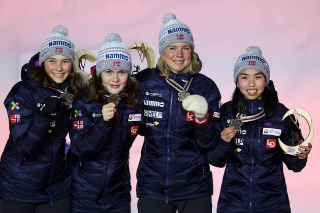 NORDIC SKIING - FIS Nordic World Ski Championships Oberstdorf 2021 OBERSTDORF,GERMANY,27.FEB.21 - NORDIC SKIING, Ski jumping, Skispringen, Ski, nordisch - FIS Nordic World Ski Championships, normal hill, ladies, team event, award ceremony. Image shows Silje Opseth, Anna Odine Stroem, Maren Lundby and Thea Minyan Bjoerseth (NOR). Keywords: medal. GEPAxpictures xChristianxWalgram
