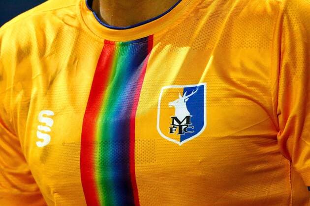 Mandatory Credit: Photo by Ryan Crockett JMP Shutterstock (11827635ag) Rainbow design on the shirt of Mal Benning of Mansfield Town Mansfield Town v Forest Green Rovers, UK - 23 Mar 2021 EDITORIAL USE ONLY No use with unauthorised audio, video, data, fixture lists (outside the EU), club league logos or live services. Online in-match use limited to 45 images (+15 in extra time). No use to emulate moving images. No use in betting, games or single club league player publications services. Mansfield Town v Forest Green Rovers, UK - 23 Mar 2021 EDITORIAL USE ONLY No use with unauthorised audio, video, data, fixture lists (outside the EU), club league logos or live services. Online in-match use limited to 45 images (+15 in extra time). No use to emulate moving images. No use in betting, games or Copyright: xRyanxCrockett JMP Shutterstockx 11827635ag