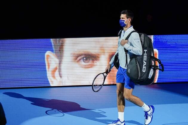 Mandatory Credit: Photo by Dave Shopland BPI Shutterstock (11013819t) Novak Djokovic of Serbia walks onto court wearing a mask Nitto ATP, Tennis Herren Finals 2020, Day Six, Tennis, The 02 Arena, London, UK - 20 Nov 2020 EDITORIAL USE ONLY No use with unauthorised audio, video, data, fixture lists, club league logos or live services. Online in-match use limited to 120 images, no video emulation. No use in betting, games or single club league player publications. Nitto ATP Finals 2020, Day Six, Tennis, The 02 Arena, London, UK - 20 Nov 2020 EDITORIAL USE ONLY No use with unauthorised audio, video, data, fixture lists, club league logos or live services. Online in-match use limited to 120 images, no video emulation. No use in betting, games or single club league player publications. Copyright: xDavexShopland BPI Shutterstockx 11013819t