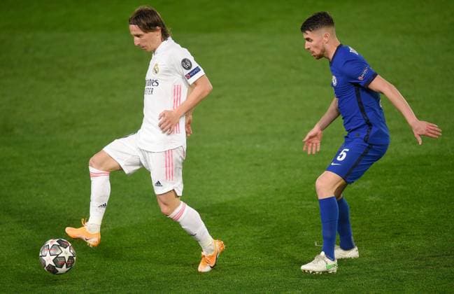 Mandatory Credit: Photo by Bagu Blanco BPI Shutterstock (11878321em) Luka Modric of Real Madrid control ahead of Jorginho of Chelsea Real Madrid v Chelsea, UEFA Champions League, Semi Final, First Leg, Football, Estadio Alfredo Di Stefano, Madrid, Spain - 27 Apr 2021 EDITORIAL USE ONLY No use with unauthorised audio, video, data, fixture lists, club league logos or live services. Online in-match use limited to 120 images, no video emulation. No use in betting, games or single club league player publications. Real Madrid v Chelsea, UEFA Champions League, Semi Final, First Leg, Football, Estadio Alfredo Di Stefano, Madrid, Spain - 27 Apr 2021 EDITORIAL USE ONLY No use with unauthorised audio, video, data, fixture lists, club league logos or live services. Online in-match use limited to 120 images, no video emulation. No use in betting, games or single club league player publications. Copyright: xBaguxBlanco BPI Shutterstockx 11878321em