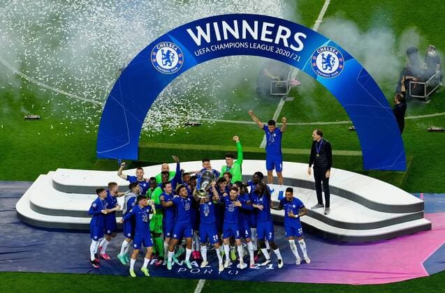 Mandatory Credit: Photo by Dave Shopland BPI Shutterstock (11978023me) Chelsea team celebrate with the trophy Manchester City v Chelsea, UEFA Champions League, Final, Football, Estadio do Dragao, Porto, Portugal - 29 May 2021 EDITORIAL USE ONLY No use with unauthorised audio, video, data, fixture lists, club league logos or live services. Online in-match use limited to 120 images, no video emulation. No use in betting, games or single club league player publications. Manchester City v Chelsea, UEFA Champions League, Final, Football, Estadio do Dragao, Porto, Portugal - 29 May 2021 EDITORIAL USE ONLY No use with unauthorised audio, video, data, fixture lists, club league logos or live services. Online in-match use limited to 120 images, no video emulation. No use in betting, games or single club league player publications. Copyright: xDavexShopland BPI Shutterstockx 11978023me