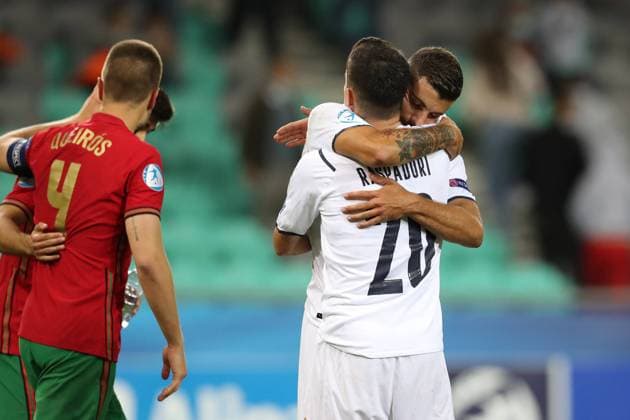 Ljubljana, Slovenia, 31st May 2021. Patrick Cutrone of Italy embraces team mate Giacomo Raspadori following the side s 5-3 defeat an exit from the tournament at the final whistle of the UEFA U21, U 21 Championships 2021 match at Stadion Stoczicw, Ljubljana. Picture credit should read: Jonathan Moscrop Sportimage EDITORIAL USE ONLY. No use with unauthorised audio, video, data, fixture lists, club league logos or live services. Online in-match use limited to 120 images, no video emulation. No use in betting, games or single club league player publications. SPI-1070-0043
