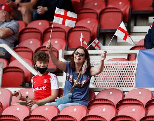 Middlesbrough, England, 6th June 2021. England fans fly the flag during the International Friendly, Länderspiel, Nationalmannschaft match at the Riverside Stadium, Middlesbrough. Picture credit should read: Darren Staples Sportimage EDITORIAL USE ONLY. No use with unauthorised audio, video, data, fixture lists, club league logos or live services. Online in-match use limited to 120 images, no video emulation. No use in betting, games or single club league player publications. SPI-1079-0019