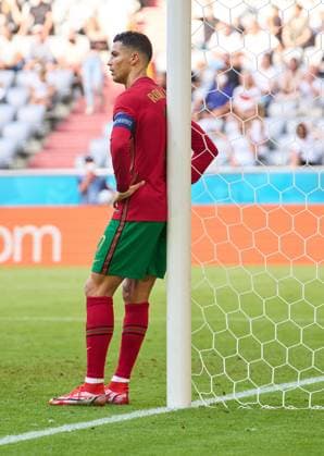 Cristiano RONALDO, Por 7 sad after Serge Gnabry, DFB 10 scores, shoots goal , Tor, Treffer,,, 1-2 jubel, celebrates his goal, happy, laugh, celebration, in the Group F match PORTUGAL - GERMANY at the football UEFA European Championships 2020 in Season 2020 2021 on June 19, 2021 in Munich, Germany.