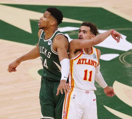 June 23, 2021, Milwaukee, WI, USA: The Atlanta Hawks Trae Young (11) watches his shot drop against the Milwaukee Bucks Giannis Antetokounmpo (34) to take a 96-94 lead in the fourth quarter in Game 1 of the NBA, Basketball Herren, USA Eastern Conference Finals on Wednesday, June 23, 2021, at the Fiserv Forum in Milwaukee. The Hawks won, 116-113. Milwaukee USA - ZUMAm67_ 0122638639st Copyright: xCurtisxComptonx