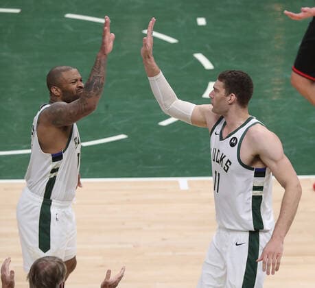 July 1, 2021, Milwaukee, WI, USA: The Milwaukee Bucks Brook Lopez, right, celebrates with teammate P.J. Tucker after scoring against the Atlanta Hawks during the second quarter in Game 5 of the NBA, Basketball Herren, USA Eastern Conference Finals at Fiserv Forum on Thursday, July 1, 2021, in Milwaukee. The Bucks won, 123-112, for a 3-2 series lead. Milwaukee USA - ZUMAm67_ 0123798777st Copyright: xCurtisxComptonx