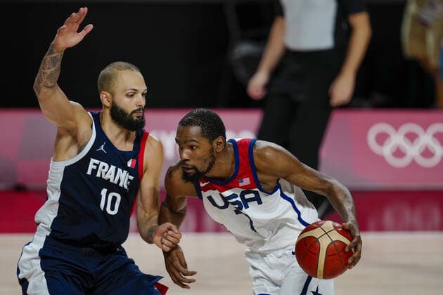 Mandatory Credit: Photo by Dave Shopland Shutterstock (12249257ai) Kevin Durant of the United States (USA) in action against Evan Fournier of France (FRA) France v United States, Basketball, Men s final, Tokyo Olympic Games, Olympische Spiele, Olympia, OS 2020, Saitama Super Arena, Japan - 07 Aug 2021 France v United States, Basketball, Men s final, Tokyo Olympic Games 2020, Saitama Super Arena, Japan - 07 Aug 2021 Copyright: xDavexShopland Shutterstockx 12249257ai
