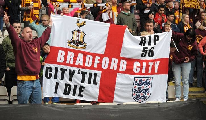 Mandatory Credit: Photo by Greig Cowie Bpi Shutterstock (4710844bn) Bradford City fans in the stands enjoy the second half to salute the memory of the 56 that died in the fire disaster 30 years ago Sky Bet League 1 2014 15 Bradford City v Barnsley Valley Parade, Bradford, United Kingdom - 25 Apr 2015 EDITORIAL USE ONLY No use with unauthorised audio, video, data, fixture lists (outside the EU), club league logos or live services. Online in-match use limited to 45 images (+15 in extra time). No use to emulate moving images. No use in betting, games or single club league player publications services. Sky Bet League 1 2014 15 Bradford City v Barnsley Valley Parade, Bradford, United Kingdom - 25 Apr 2015 EDITORIAL USE ONLY No use with unauthorised audio, video, data, fixture lists (outside the EU), club league logos or live services. Online in-match use limited to 45 images (+15 in extra time). No use to emulate moving images. No use in betting, games or Copyright: xGreigxCowie Bpi Shutterstockx 4710844bn