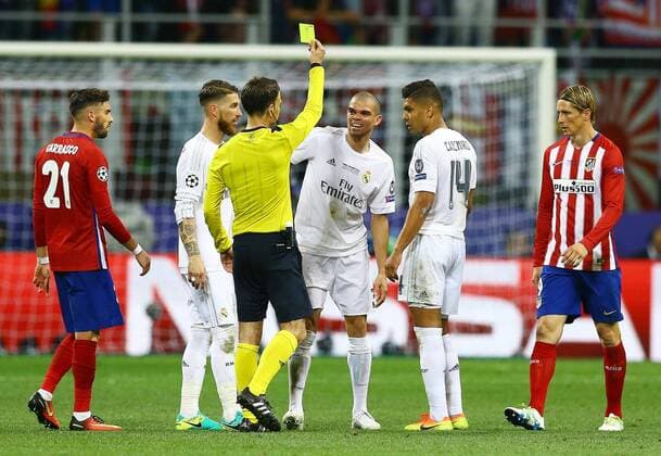Mandatory Credit: Photo by Kieran Mcmanus BPI Shutterstock (5696816cr) Referee Mr Mark Clattenburg shows Pepe of Real Madrid a yellow card during the UEFA Champions League final between Real Madrid and Atletico Madrid played at the Giuseppe Meazza Stadium (San Siro), Milan, Italy on May 28th 2016 UEFA Champions League 2015 16 Final Real Madrid v Atletico Madrid San Siro, Giuseppe Meazza, Milan, Italy - 28 May 2016 EDITORIAL USE ONLY No use with unauthorised audio, video, data, fixture lists, club league logos or live services. Online in-match use limited to 75 images, no video emulation. No use in betting, games or single club league player publications. UEFA Champions League 2015 16 Final Real Madrid v Atletico Madrid San Siro, Giuseppe Meazza, Milan, Italy - 28 May 2016 EDITORIAL USE ONLY No use with unauthorised audio, video, data, fixture lists, club league logos or live services. Online in-match use limited to 75 images, no video emulation. No use in betting, games or single club league player publications. Copyright: xKieranxMcmanus BPI Shutterstockx 5696816cr