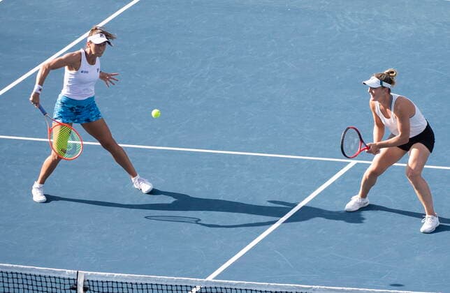 August 15, 2021, Montreal, PQ, Canada: Gabriela Dabrowski, right, of Canada, looks on as partner Luisa Stefani, of Brazil, returns to Darija Jurak, of Croatia, and Andreja Klepac, of Slovenia, during the doubles final of the National Bank Open womenöÄÃ s tennis tournament in Montreal, Saturday, Aug. 14, 2021. Gabriela Dabrowski, Luisa Stefani, Darija Jurak, Andreja Klepac - ZUMAc35_ 20210815_zaf_c35_155 Copyright: xGrahamxHughesx