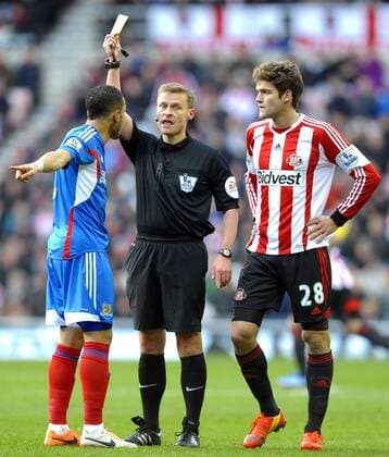 Mandatory Credit: Photo by Greig Cowie Bpi Shutterstock (3556421r) Referee Mike Jones books Liam Rosenior of Hull City as Marcos Alonso of Sunderland stands by Barclays Premier League 2013 14, Sunderland v Hull City, Stadium of Light (Sunderland, GB) - 27 Aug 2013 EDITORIAL USE ONLY No use with unauthorised audio, video, data, fixture lists (outside the EU), club league logos or live services. Online in-match use limited to 45 images (+15 in extra time). No use to emulate moving images. No use in betting, games or single club league player publications services. Barclays Premier League 2013 14, Sunderland v Hull City, Stadium of Light (Sunderland, GB) - 27 Aug 2013 EDITORIAL USE ONLY No use with unauthorised audio, video, data, fixture lists (outside the EU), club league logos or live services. Online in-match use limited to 45 images (+15 in extra time). No use to emulate moving images. No use in betting, games or Copyright: xGreigxCowie Bpi Shutterstockx 3556421r
