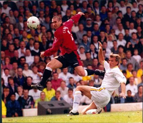 Mandatory Credit: Photo by Ted Blackbrow ANL Shutterstock (1458555a) Leeds United V Manchester United, ManU Premier League Match At Elland Road Leeeds. Manchester Uniteds Eric Cantona Gets Past A Challenge Of Leeds Defender Richard Jobson Leeds United V Manchester United Premier League Match At Elland Road Leeeds. Manchester Uniteds Eric Cantona Gets Past A Challenge Of Leeds Defender Richard Jobson EDITORIAL USE ONLY No use with unauthorised audio, video, data, fixture lists (outside the EU), club league logos or live services. Online in-match use limited to 45 images (+15 in extra time). No use to emulate moving images. No use in betting, games or single club league player publications services. Leeds United V Manchester United Premier League Match At Elland Road Leeeds. Manchester Uniteds Eric Cantona Gets Past A Challenge Of Leeds Defender Richard Jobson EDITORIAL USE ONLY No use with unauthorised audio, video, data, fixture lists (outside the EU), club league logos or live services. Online in-match use limited to 45 images (+15 in extra time). No use to emulate moving images. No use in betting, games or Copyright: xTedxBlackbrow ANL Shutterstockx 1458555a