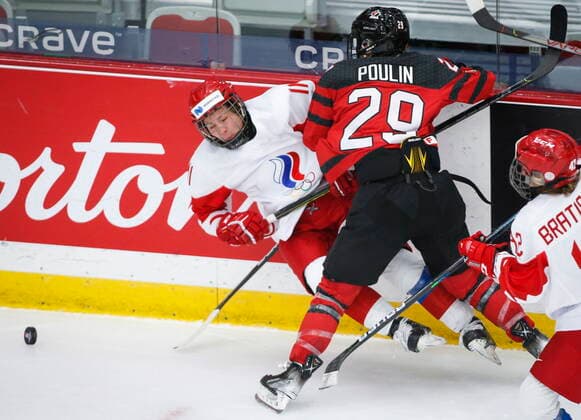 August 22, 2021, Calgary, ab, Canada: Russia s Liana Ganeyeva, left, is checked by Canada s Marie-Philip Poulin during second period IIHF Women s World Championship, WM, Weltmeisterschaft hockey action in Calgary, Alta., Sunday, Aug. 22, 2021. Liana Ganeyeva, Marie-Philip Poulin - ZUMAc35_ 20210822_zaf_c35_064 Copyright: xJeffxMcintoshx