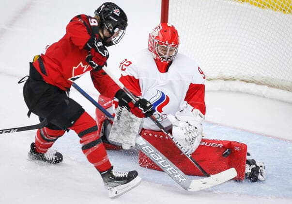 August 22, 2021, Calgary, ab, Canada: Russia s goalie Nadezhda Morozova, right, stops a shot from Canada s Marie-Philip Poulin during first period IIHF Women s World Championship, WM, Weltmeisterschaft hockey action in Calgary, Alta., Sunday, Aug. 22, 2021. Nadezhda Morozova, Marie-Philip Poulin - ZUMAc35_ 20210822_zaf_c35_068 Copyright: xJeffxMcintoshx