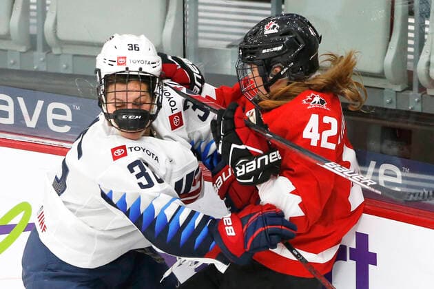 Canada player Claire Thompson, rt, runs into USA player Lacey Eden, lt, during IIHF Women s World Championship, WM, Weltmeisterschaft gold medal play in Calgary, Alberta, Canada on Aug. 31, 2021. digital photo by Larry MacDougal Claire Thompson, Lacey Eden