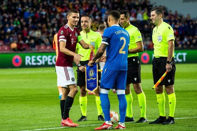 Mandatory Credit: Photo by Kirk O Rourke Rangers FC Shutterstock (12516385hd) Rangers captain James Tavernier and David Pavelka of Sparta Prague swap pennants during the Europa League match at the Generali Ceská Pojistovna Arena, Prague. Sparta Prague v Rangers, UEFA Europa League Group A, Football, Generali Arena, Prague, Czech Republic - 30 Sep 2021 Sparta Prague v Rangers, UEFA Europa League Group A, Football, Generali Arena, Prague, Czech Republic - 30 Sep 2021 Copyright: xKirkxO Rourke RangersxFC Shutterstockx 12516385hd