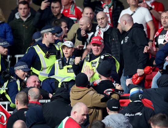 Mandatory Credit: Photo by Matt Impey Shutterstock (12534940a) Police fight with Hungary fans in the stands England v Hungary, Football, World Cup Qualifying, Group I, Wembley Stadium, Wembley, London, UK - 12 10 2021 Editorial use only England v Hungary, Football, World Cup Qualifying, Group I, Wembley Stadium, Wembley, London, UK - 12 10 2021 Editorial use only Copyright: xMattxImpey Shutterstockx 12534940a