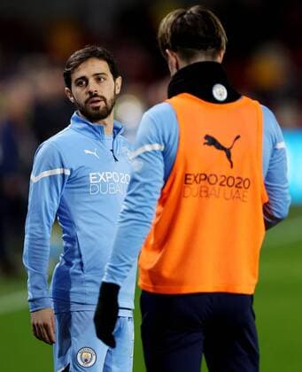 Mandatory Credit: Photo by Andrew Fosker Shutterstock (12660331y) Bernardo Silva of Manchester City and team mates warm up. Brentford v Manchester City, Premier League, Football, Brentford Community Stadium, London, UK - 29 Dec 2021 EDITORIAL USE ONLY No use with unauthorised audio, video, data, fixture lists, club league logos or live services. Online in-match use limited to 120 images, no video emulation. No use in betting, games or single club league player publications. Brentford v Manchester City, Premier League, Football, Brentford Community Stadium, London, UK - 29 Dec 2021 EDITORIAL USE ONLY No use with unauthorised audio, video, data, fixture lists, club league logos or live services. Online in-match use limited to 120 images, no video emulation. No use in betting, games or single club league player publications. Copyright: xAndrewxFosker Shutterstockx 12660331y