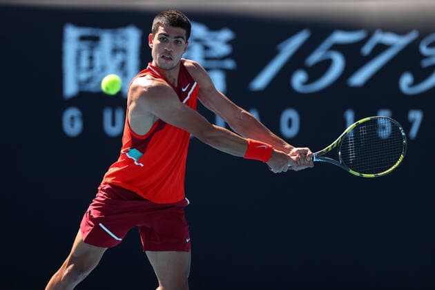 Mandatory Credit: Photo by Ella Ling Shutterstock (12763715cy) Carlos Alcaraz Garfia during his second round match Australian Open, Day Three, Tennis, Melbourne Park, Melbourne, Australia - 19 Jan 2022 Australian Open, Day Three, Tennis, Melbourne Park, Melbourne, Australia - 19 Jan 2022 Copyright: xEllaxLing Shutterstockx 12763715cy