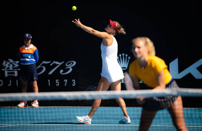 Mandatory Credit: Photo by Rob Prange Shutterstock (12763713dr) Anna Karolina Schmiedlova of Slovakia & Kimberley Zimmermann of Belgium in action during the first round of doubles at the 2022 Australian Open Grand Slam tennis tournament Australian Open, Day Three, Tennis, Melbourne Park, Melbourne, Australia - 19 Jan 2022 Australian Open, Day Three, Tennis, Melbourne Park, Melbourne, Australia - 19 Jan 2022 Copyright: xRobxPrange Shutterstockx 12763713dr