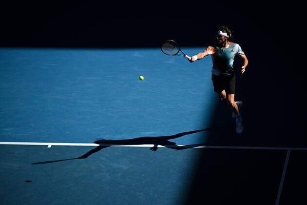 Mandatory Credit: Photo by James Gourley Shutterstock (12765058ex) Stefanos Tsitsipas during his second round match Australian Open, Day Four, Tennis, Melbourne Park, Melbourne, Australia - 20 Jan 2022 Australian Open, Day Four, Tennis, Melbourne Park, Melbourne, Australia - 20 Jan 2022 Copyright: xJamesxGourley Shutterstockx 12765058ex
