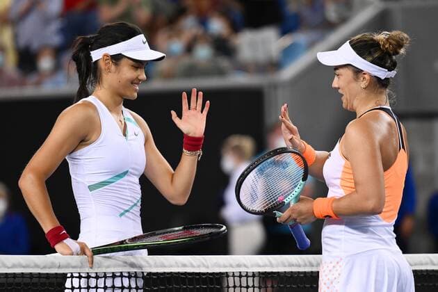 Mandatory Credit: Photo by James Gourley Shutterstock (12765058lp) Emma Raducanu congratulates Danka Kovinic after their second round match Australian Open, Day Four, Tennis, Melbourne Park, Melbourne, Australia - 20 Jan 2022 Australian Open, Day Four, Tennis, Melbourne Park, Melbourne, Australia - 20 Jan 2022 Copyright: xJamesxGourley Shutterstockx 12765058lp