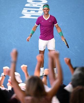 Mandatory Credit: Photo by James Gourley Shutterstock (12773752fm) Rafael Nadal celebrates victory in his quarter-final match Australian Open, Day Nine, Tennis, Melbourne Park, Melbourne, Australia - 25 Jan 2022 Australian Open, Day Nine, Tennis, Melbourne Park, Melbourne, Australia - 25 Jan 2022 Copyright: xJamesxGourley Shutterstockx 12773752fm