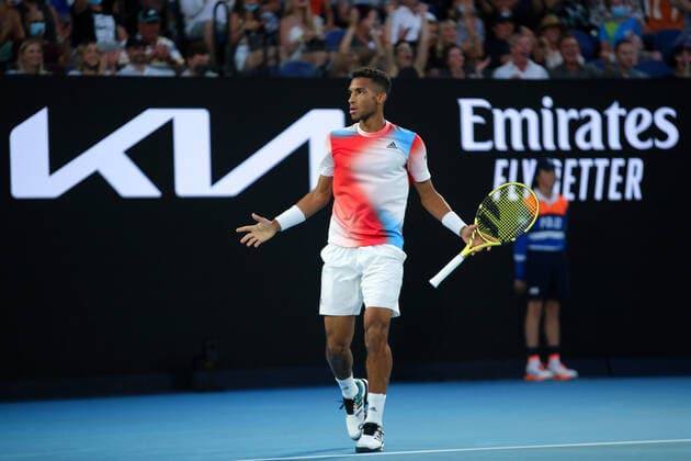 Mandatory Credit: Photo by Ella Ling Shutterstock (12773755db) Felix Auger-Aliassime during his quarter final match Australian Open, Day Ten, Tennis, Melbourne Park, Melbourne, Australia - 26 Jan 2022 Australian Open, Day Ten, Tennis, Melbourne Park, Melbourne, Australia - 26 Jan 2022 Copyright: xEllaxLing Shutterstockx 12773755db