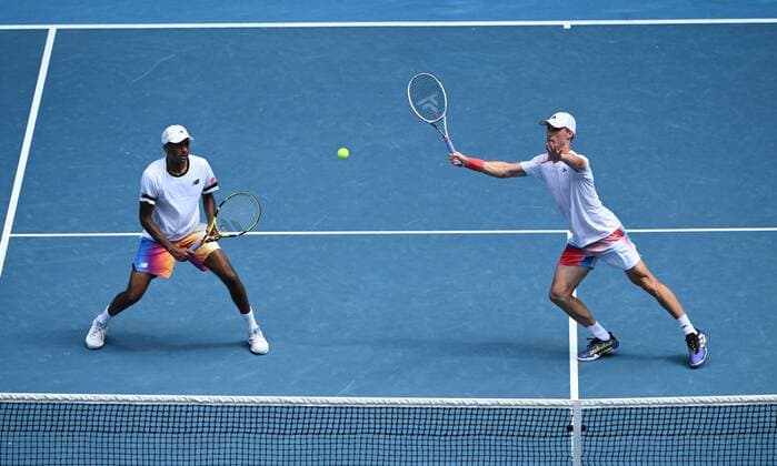 Mandatory Credit: Photo by James Gourley Shutterstock (12773760de) Joe Salisbury and Rajeev Ram in Men s Doubles semi final action Australian Open, Day Eleven, Tennis, Melbourne Park, Melbourne, Australia - 27 Jan 2022 Australian Open, Day Eleven, Tennis, Melbourne Park, Melbourne, Australia - 27 Jan 2022 Copyright: xJamesxGourley Shutterstockx 12773760de