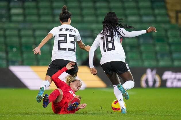 Mandatory Credit: Photo by Joe Toth Shutterstock (12812705g) Cloé Lacasse of Canada Women is brought down by Sara Doorsoun of Germany Women and Nicole Anyomi of Germany Women Canada Women v Germany Women, Arnold Clark Cup 2022, Football, Carrow Road, Norwich, UK - 20 Feb 2022 EDITORIAL USE ONLY No use with unauthorised audio, video, data, fixture lists, club league logos or live services. Online in-match use limited to 120 images, no video emulation. No use in betting, games or single club league player publications. Canada Women v Germany Women, Arnold Clark Cup 2022, Football, Carrow Road, Norwich, UK - 20 Feb 2022 EDITORIAL USE ONLY No use with unauthorised audio, video, data, fixture lists, club league logos or live services. Online in-match use limited to 120 images, no video emulation. No use in betting, games or single club league player publications. Copyright: xJoexToth Shutterstockx 12812705g