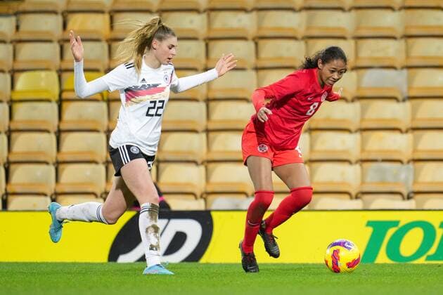 Mandatory Credit: Photo by Joe Toth Shutterstock (12812705o) Jule Brand of Germany Women and Jayde Riviere of Canada Women Canada Women v Germany Women, Arnold Clark Cup 2022, Football, Carrow Road, Norwich, UK - 20 Feb 2022 EDITORIAL USE ONLY No use with unauthorised audio, video, data, fixture lists, club league logos or live services. Online in-match use limited to 120 images, no video emulation. No use in betting, games or single club league player publications. Canada Women v Germany Women, Arnold Clark Cup 2022, Football, Carrow Road, Norwich, UK - 20 Feb 2022 EDITORIAL USE ONLY No use with unauthorised audio, video, data, fixture lists, club league logos or live services. Online in-match use limited to 120 images, no video emulation. No use in betting, games or single club league player publications. Copyright: xJoexToth Shutterstockx 12812705o
