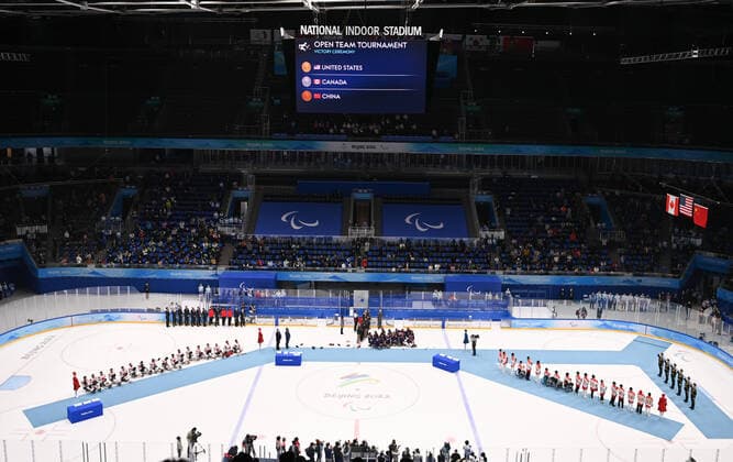 (220313) -- BEIJING, March 13, 2022 -- Gold medalists Team of the United States (C), silver medalists Team of Canada (L) and bronze medalists Team of China attend the awarding ceremony for the Para Ice hockey, Eishockey event of the Beijing 2022 Paralympic Winter games, Winterspiele,Spiele, Summer games at National Indoor Stadium in Beijing, capital of China, March 13, 2022. ) (SP)CHINA-BEIJING-WINTER PARALYMPICS-PARA ICE HOCKEY-AWARDING CEREMONY (CN) WuxHuiwo