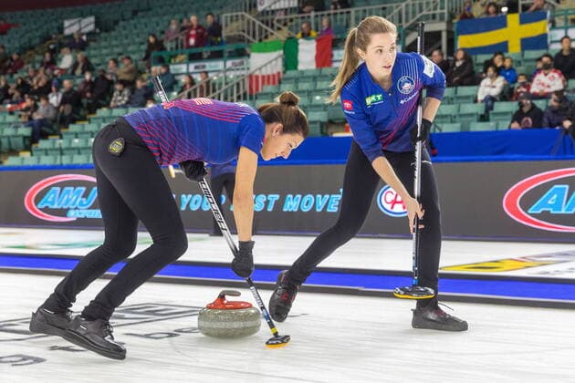 March 20, 2022, Prince George, BC, CANADA: United States second Vicky Persinger, left, and third Sarah Anderson sweep in front of a stone at CN Centre on Sunday afternoon at the Womens World Curling in Prince George, B.C., Sunday, March 20, 2022. Canada News - March 20, 2022 - ZUMAc35_ 20220320_zaf_c35_074 Copyright: xJamesxDoylex