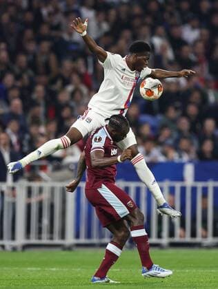 Mandatory Credit: Photo by Simon Dael Shutterstock (12893327ez) Michail Antonio of West Ham United and Castello Lukeba of Lyon Olympique Lyonnais v West Ham United, UEFA Europa League, Quarter Final, Second Leg, Football, Groupama Stadium, Lyon, France - 14 Apr 2022 EDITORIAL USE ONLY No use with unauthorised audio, video, data, fixture lists, club league logos or live services. Online in-match use limited to 120 images, no video emulation. No use in betting, games or single club league player publications. Olympique Lyonnais v West Ham United, UEFA Europa League, Quarter Final, Second Leg, Football, Groupama Stadium, Lyon, France - 14 Apr 2022 EDITORIAL USE ONLY No use with unauthorised audio, video, data, fixture lists, club league logos or live services. Online in-match use limited to 120 images, no video emulation. No use in betting, games or single club league player publications. Copyright: xSimonxDael Shutterstockx 12893327ez