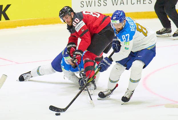 Pierre-Luc Dubois Nr. 80 of Canada compete, fight for the puck against, Adil Beketayev, KAZ 87 in the match CANADA - KAZAKHSTAN of the IIHF Ice hockey, Eishockey World Championship, WM, Weltmeisterschaft Group B in Helsinki, Finland, May 19, 2022, Season 2021 2022