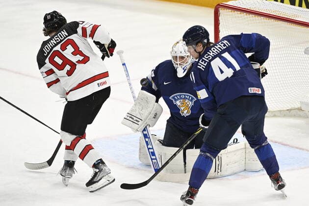 Eishockey, WM Finale, Finnland - Kanada From left Kent Johnson of Canada, Jussi Olkinuora, golie of Finland, Miro Heiskanen of Finland in action during the 2022 IIHF Ice hockey, Eishockey World Championship, WM, Weltmeisterschaft gold medal match between Canada and Finland, Tampere, Finland, May 29, 2022. (CTKxPhoto MichalxKamaryt) CTKPhotoP2022052905523