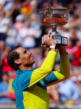 Mandatory Credit: Photo by Javier Garcia Shutterstock (12960016bn) Rafael Nadal celebrates with the Coupe de Mousquetaires, the mens trophy, after winning his 14th Roland Garros French Open Tennis, Day 15, Roland Garros, Paris, France - 05 Jun 2022 French Open Tennis, Day 15, Roland Garros, Paris, France - 05 Jun 2022 Copyright: xJavierxGarcia Shutterstockx 12960016bn