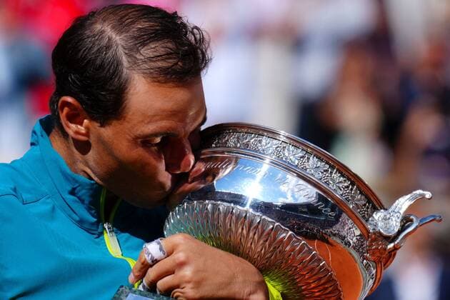 Mandatory Credit: Photo by Javier Garcia Shutterstock (12960016bq) Rafael Nadal celebrates with the Coupe de Mousquetaires, the mens trophy, after winning his 14th Roland Garros French Open Tennis, Day 15, Roland Garros, Paris, France - 05 Jun 2022 French Open Tennis, Day 15, Roland Garros, Paris, France - 05 Jun 2022 Copyright: xJavierxGarcia Shutterstockx 12960016bq