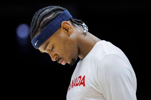 July 1, 2022, Hamilton, ON, CANADA: Canada s Shai Gilgeous-Alexander (2) stands for the Canadian national anthem ahead of FIBA international men s World Cup basketball qualifying action against Dominican Republic, in Hamilton, Ont., Friday, July 1, 2022. Canada News - July 1, 2022 - ZUMAc35_ 20220701_zaf_c35_288 Copyright: xColexBurstonx