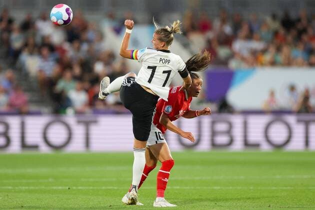 Mandatory Credit: Photo by Simon Dael Shutterstock (13040203ay) Alexandra Popp of Germany and Laura Feiersinger of Austria battle for the ball Germany v Austria, Womens UEFA European Championship, EM, Europameisterschaft Quarter Final, Football, Brentford Community Stadium, London, UK - 21 Jul 2022 Germany v Austria, Womens UEFA European Championship, Quarter Final, Football, Brentford Community Stadium, London, UK - 21 Jul 2022 Copyright: xSimonxDael Shutterstockx 13040203ay