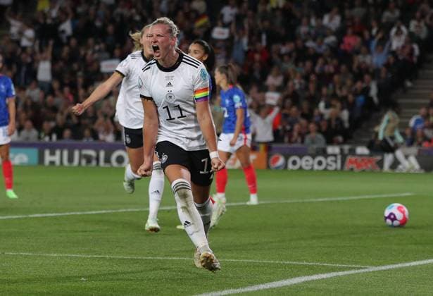 Milton Keynes, England, 27th July 2022. Alexandra Popp of Germany celebrates after scoring to make it 2-1 during the UEFA Women s European Championship, EM, Europameisterschaft 2022 match at stadium:mk, Milton Keynes. Picture credit should read: Paul Terry Sportimage EDITORIAL USE ONLY. No use with unauthorised audio, video, data, fixture lists, club league logos or live services. Online in-match use limited to 120 images, no video emulation. No use in betting, games or single club league player publications. SPI-1770-0068