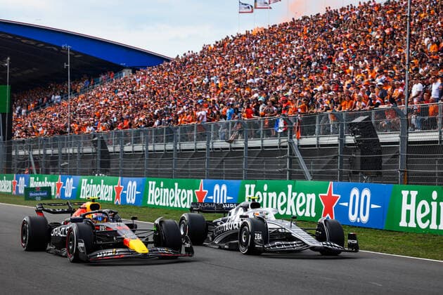 11 PEREZ Sergio (mex), Red Bull Racing RB18, 22 TSUNODA Yuki (jap), Scuderia AlphaTauri AT03, action during the Formula 1 Heineken Dutch Grand Prix 2022, 15th round of the 2022 FIA Formula One World Championship, WM, Weltmeisterschaft from September 2 to 4, 2022 on the Zandvoort Circuit, in Netherlands, Belgium - F1 - DUTCH GRAND PRIX 2022 DPPI Panoramic 20220902_G00D9590