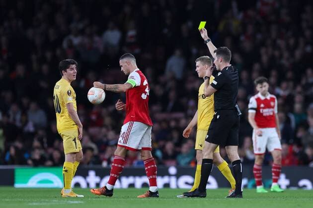 Mandatory Credit: Photo by Simon Dael Shutterstock (13442648ag) Granit Xhaka of Arsenal is shown a yellow card Arsenal v Bodo Glimt, UEFA Europa League, Group A, Football, Emirates Stadium, London, UK - 06 Oct 2022 EDITORIAL USE ONLY No use with unauthorised audio, video, data, fixture lists, club league logos or live services. Online in-match use limited to 120 images, no video emulation. No use in betting, games or single club league player publications. Arsenal v Bodo Glimt, UEFA Europa League, Group A, Football, Emirates Stadium, London, UK - 06 Oct 2022 EDITORIAL USE ONLY No use with unauthorised audio, video, data, fixture lists, club league logos or live services. Online in-match use limited to 120 images, no video emulation. No use in betting, games or single club league player publications. Copyright: xSimonxDael Shutterstockx 13442648ag